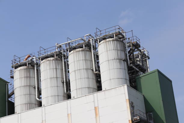 istock Urban industrial architecture including pipes and silos 1217839179