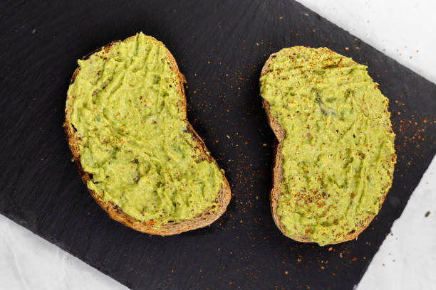istock Avocado spread with grated chilly peppers on the sliced toasted bread 1217840206