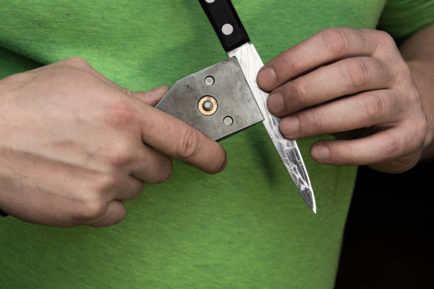 istock Installing the knife holder for sharpening the knife itself. 1217841938