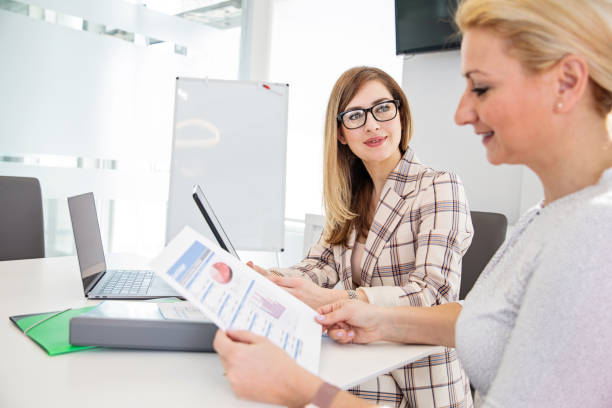 istock Two Young Business Girls 1217842084