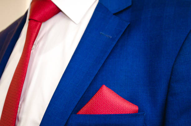 istock White shirt, suit, and red tie. 1217843688