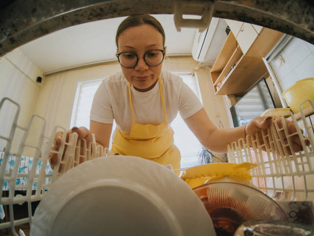 istock Washing dishes at home 1217846987