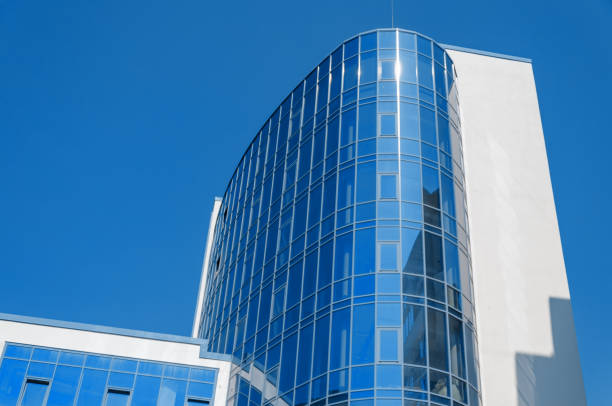 istock Modern office building in blue glass 1217851516