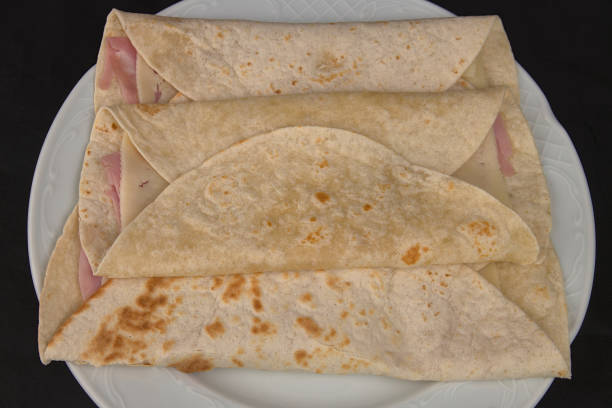 istock Pancakes, ham and cheese burritos 1217851604