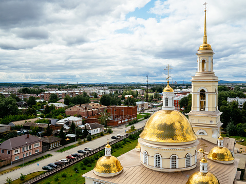 Nevyansk, Russia, August 9, 2019: the Transfiguration Cathedral is located in Nevyansk, Sverdlovsk region. The temple with its gold shining domes, the view from the top