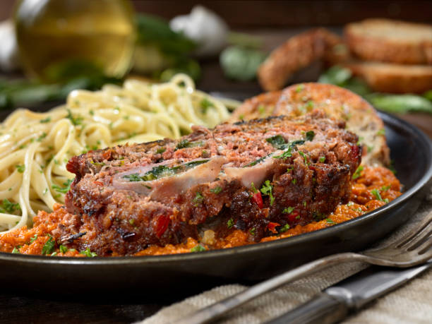 istock Sicilian Style Rolled Meatloaf with Deli Ham, Basil and Mozzarella 1217855854