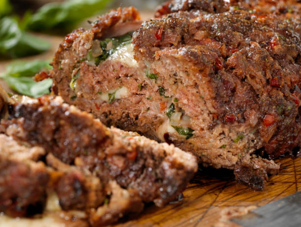 istock Sicilian Style Rolled Meatloaf with Deli Ham, Basil and Mozzarella 1217855890
