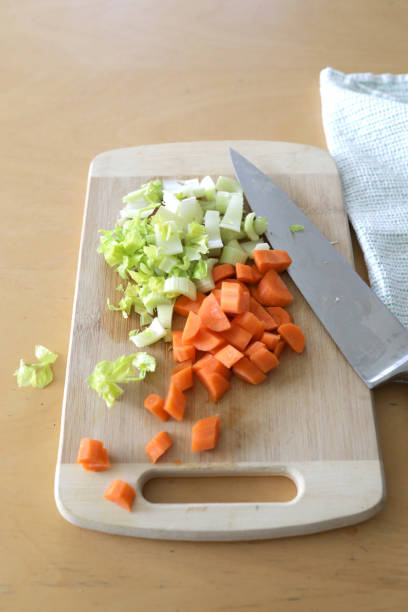 istock Prepping Carrots and Celery on a Cutting Board 1217857290