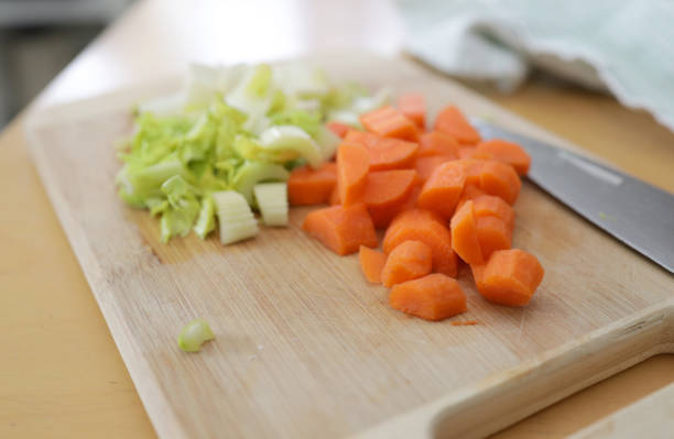 istock Chopped Carrots and Celery on a Cutting Board at Home 1217857303