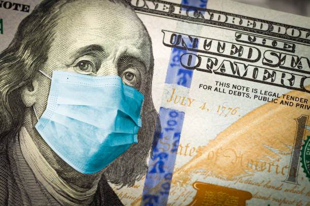 Benjamin Franklin With Worried and Concerned Expression Wearing Medical Face Mask On One Hundred Dollar Bill Benjamin Franklin With Worried and Concerned Expression Wearing Medical Face Mask On One Hundred Dollar Bill. benjamin franklin photos stock pictures, royalty-free photos & images
