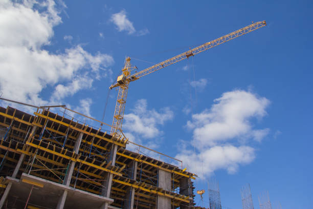 istock Tower crane at a construction site. Lifting heavy loads 1217857641