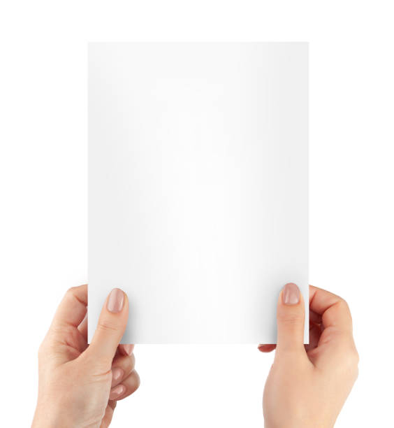 istock Woman hands holding blank paper sheet A4 size or letter paper 1217859404