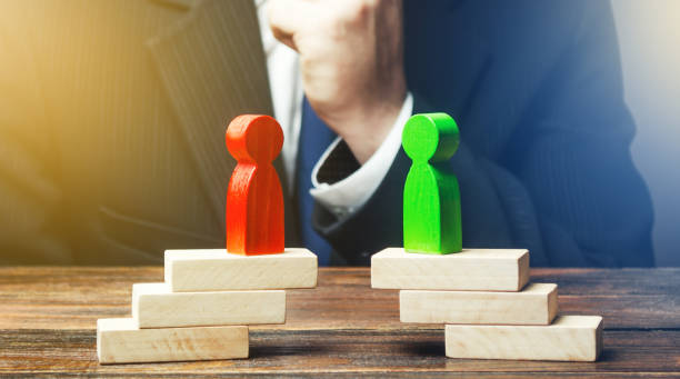 istock A businessman is studying the negotiation process and rivalry parties. Truce agreement. Resolution disputes, compromise. Establishing contact. Candidates Political Debate. De-escalation of conflict 1217859985