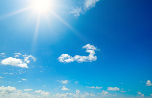 istock Couds in the blue sky. Bright midday sun illuminates the space. 1217860890