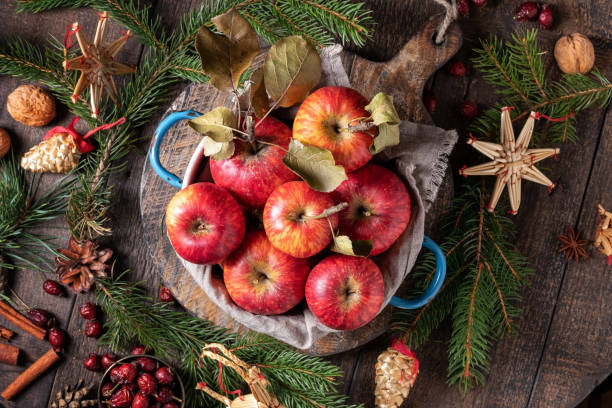 istock Fresh apples in a blue pot, with Christmas decoration 1217861361