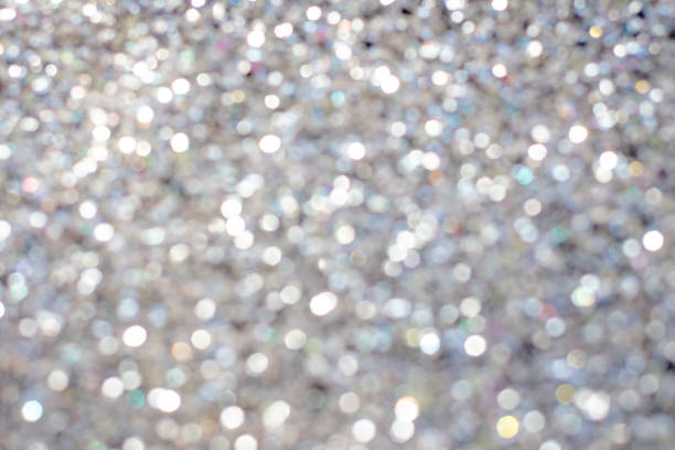 istock Golden silver glitter bokeh blurred abstract background overlay 1217861654