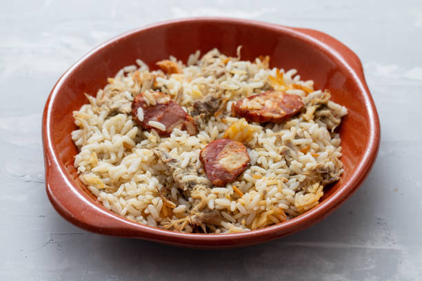 istock typical portuguese dish rice with duck and smoked sausage 1217865301
