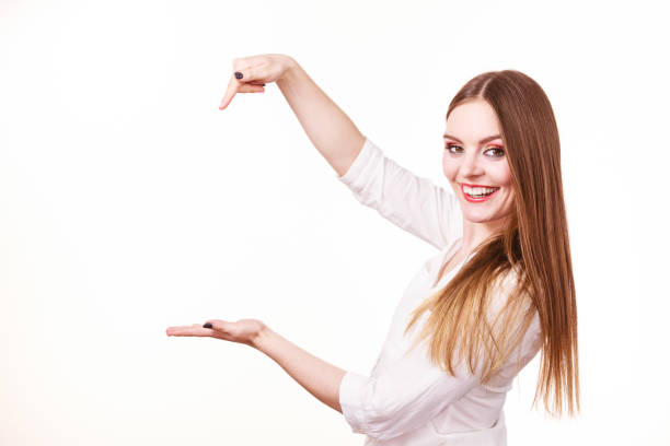 istock Woman holds empty hand copy space for product 1217868243