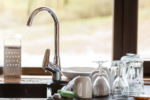 istock Washing up. kitchen sink and dishwares 1217868277