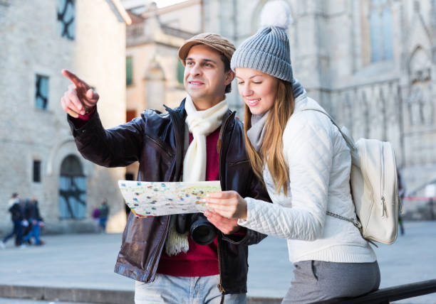 istock couple in the historic center pointing finger 1217868301