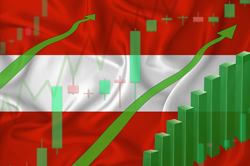 Rising against the background of the flag of Austria and rising prices for the currency of the country. Rising stock prices of companies and cryptocurrencies.