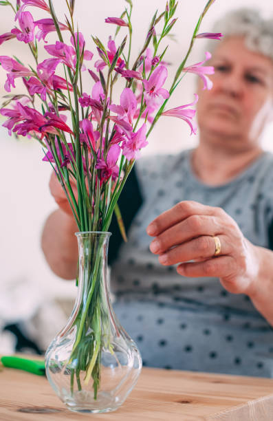 istock Woman Making Flower Arrangement 1217874185