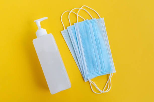 istock Hand Sanitizer and 3 layer surgical mask 1217874744