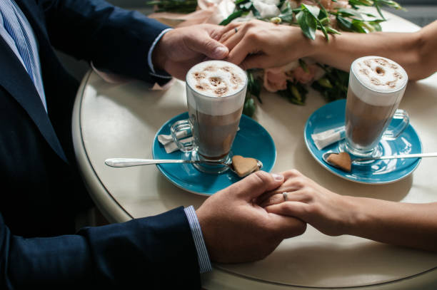 istock Loving couple in cafe 1217876129