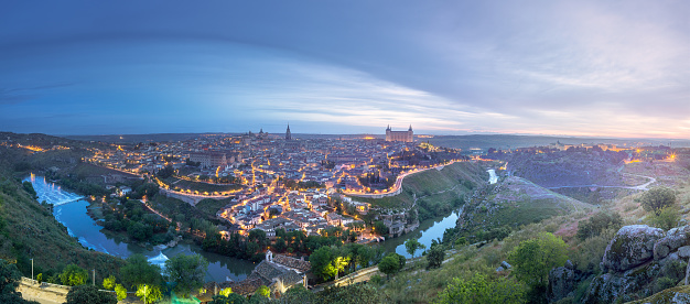 Panorama view of ancient city and Alcazar castle on a hill over the Tagus River, Toledo, Spain