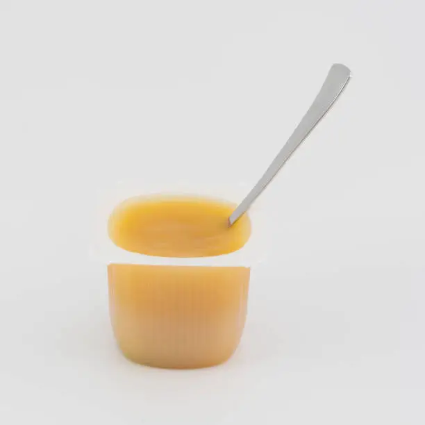 Applesauce portion on white background