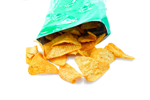 istock Heap of open packages and corn chip 1217878596