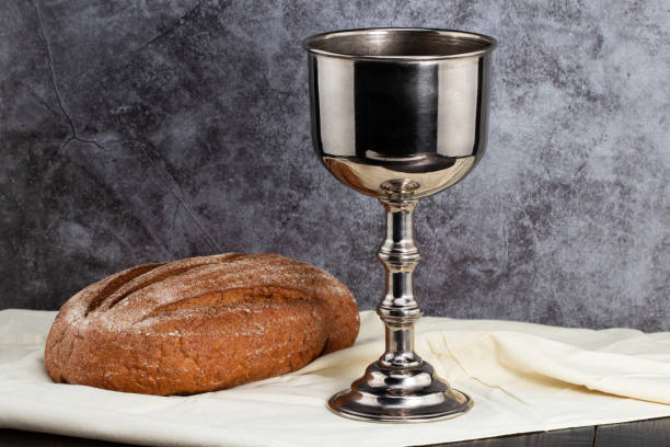 istock holy communion chalice with wine and bread 1217879751