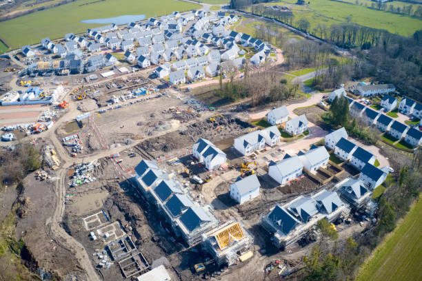 istock Suburban house development aerial view with countryside views uk 1217880632