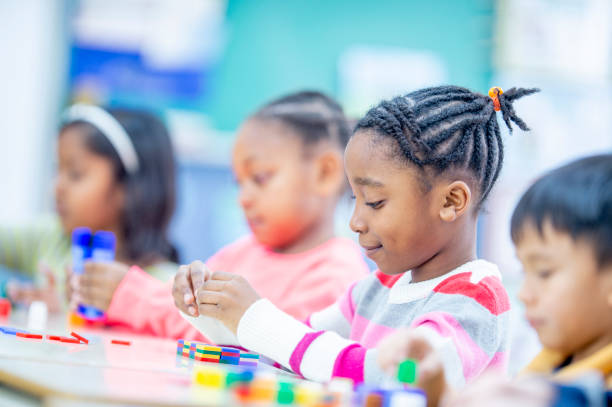 istock Diverse group of kids in the classroom 1217881078