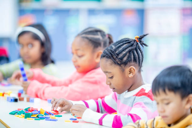 istock Diverse group of kids in the classroom 1217881081