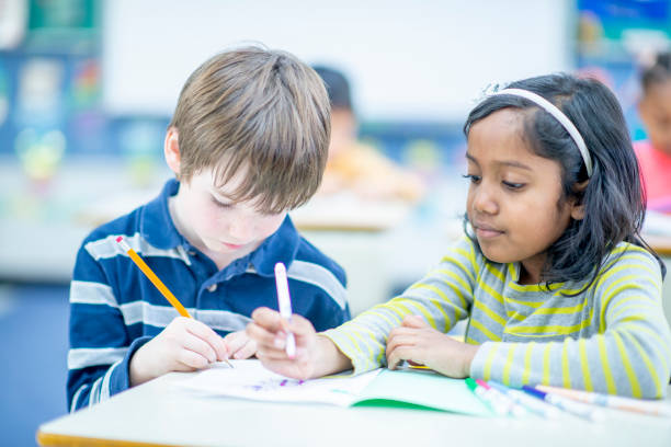 istock Diverse group of kids in the classroom 1217881082