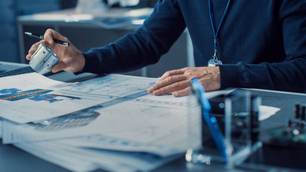 Heavy Industry Engineer Draws Engine Concept Blueprint. Engineering Bureau and Industrial Design Agency with Various Robotic, Architectural and Machinery Components