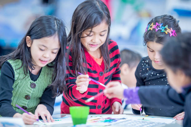 istock Diverse group of kids in the classroom 1217883700