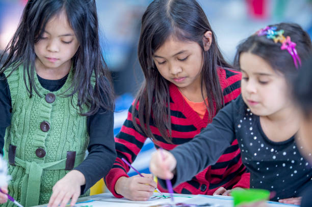 istock Diverse group of kids in the classroom 1217883708