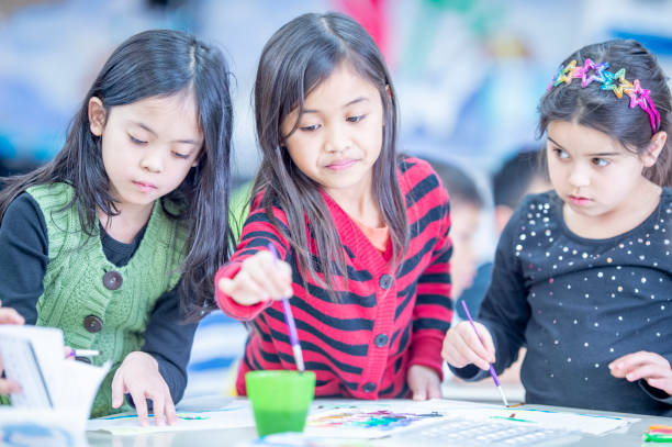 istock Diverse group of kids in the classroom 1217883711