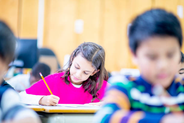 istock Diverse group of kids in the classroom 1217883712