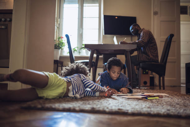 istock Father working from home during the lockdown 1217884121