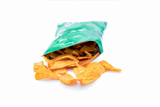 istock Heap of open packages and corn chip 1217885109