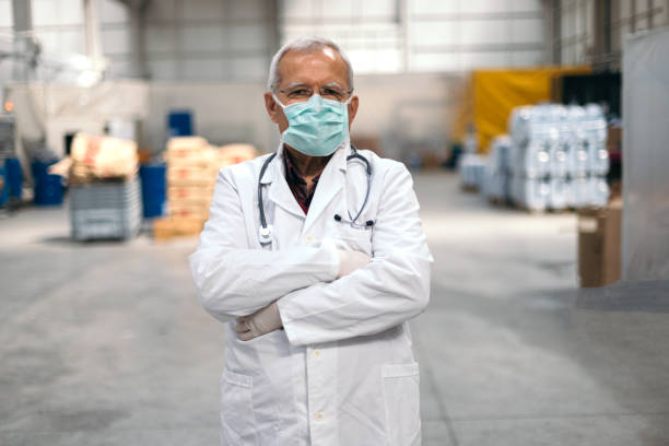istock Senior doctor  wearing face protective mask to prevent Coronavirus 1217887145