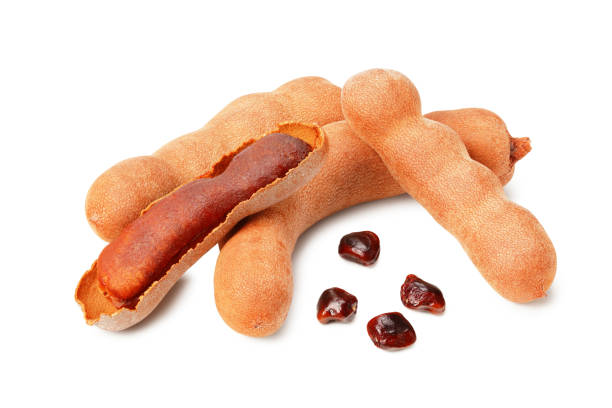 istock fresh tamarind fruits isolated on white background 1217889624