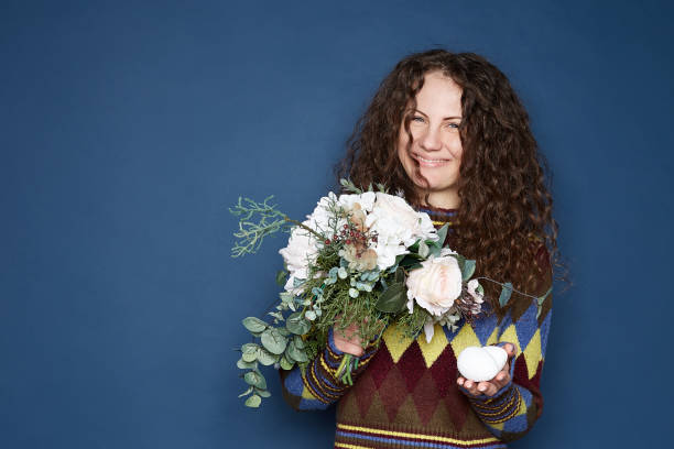 istock Woman Celebrating Easter indoors 1217893208