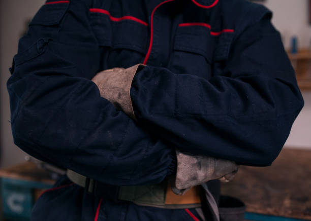 istock Metal worker with crossed arms 1217895003