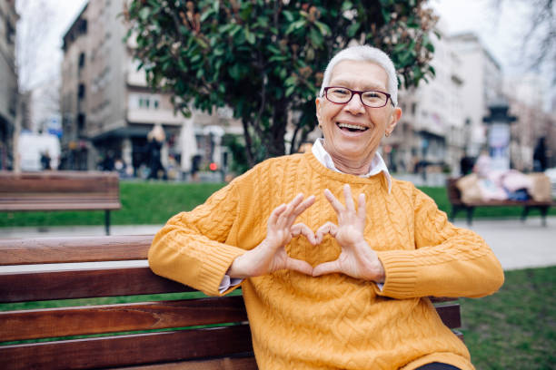 istock Happy lady showing the heart 1217896259