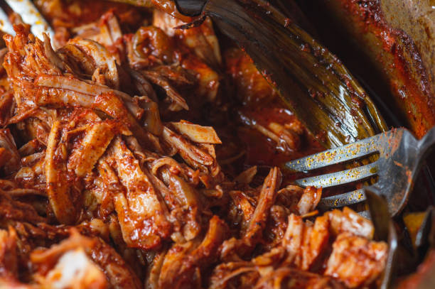 istock Preparing Cochinita Pibil, Pit-Roasted Marinated Pork From Yucatan 1217896646
