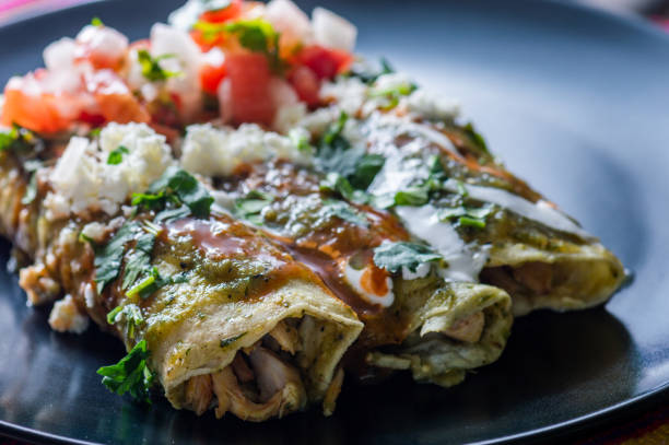 istock Chicken Filled Green Enchiladas, Traditional Mexican Meal 1217897467